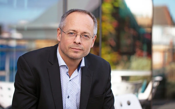 portrait of associate director edward daines